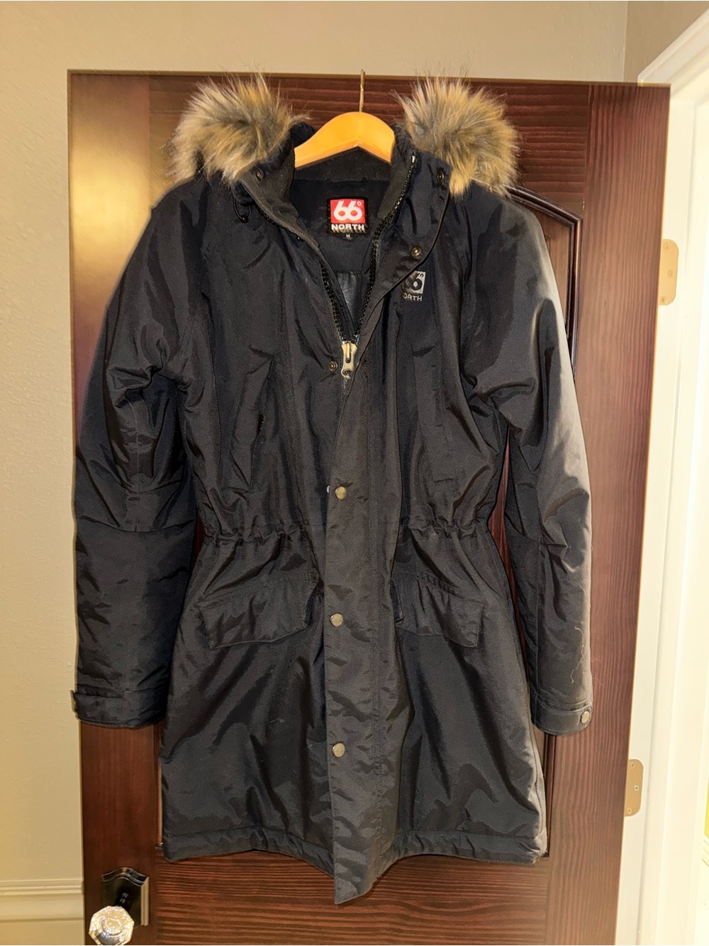66 North women’s Heckla Black Coat with Faux Fur Hood